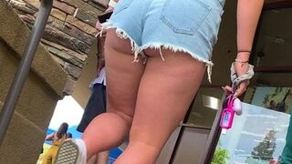 Teen with big butt and thighs showing some ass cheeks.