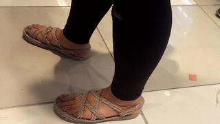 Girlfriend's cute long feets toes in new sandals