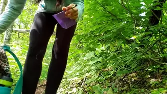 Woman puts pad in the forest