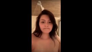 Stunning brunette in the shower