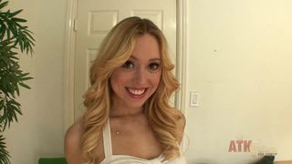 Pretty blonde babe Lucy Tyler strips down and uses her vibrator on her clit to climax