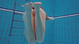 Gorgeous Polish teenie Alice swimming without clothes on