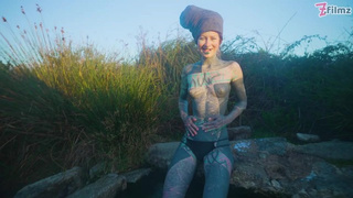 Alternative lovers having naughty outdoor sex in outdoor fine spring