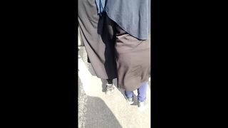 Iranian girl with nice big ass in tight gown walking