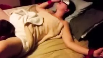 Cuckoliding wife is blindfolded and getting shared around with a friend