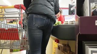 Small ass in jeans shopping check out