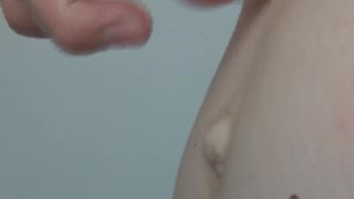 Girl rubbing her outie belly button knob