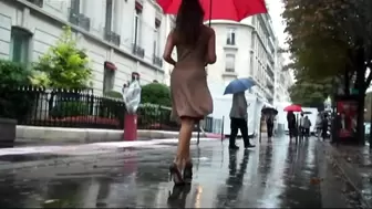 Beauty woman moves her ass in a long dress and high heels