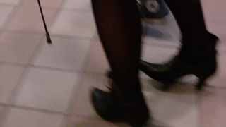 Candid long legs in pantyhose and boots at Mc Donalds