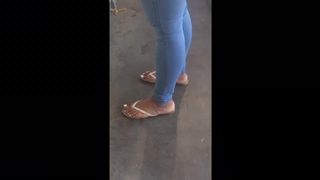 Candid latina girl feet flip flops