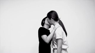 Asian girl kiss girl